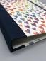 Preview: Buch Ringmechanik Herzen blau bunt Front Leinenrücken